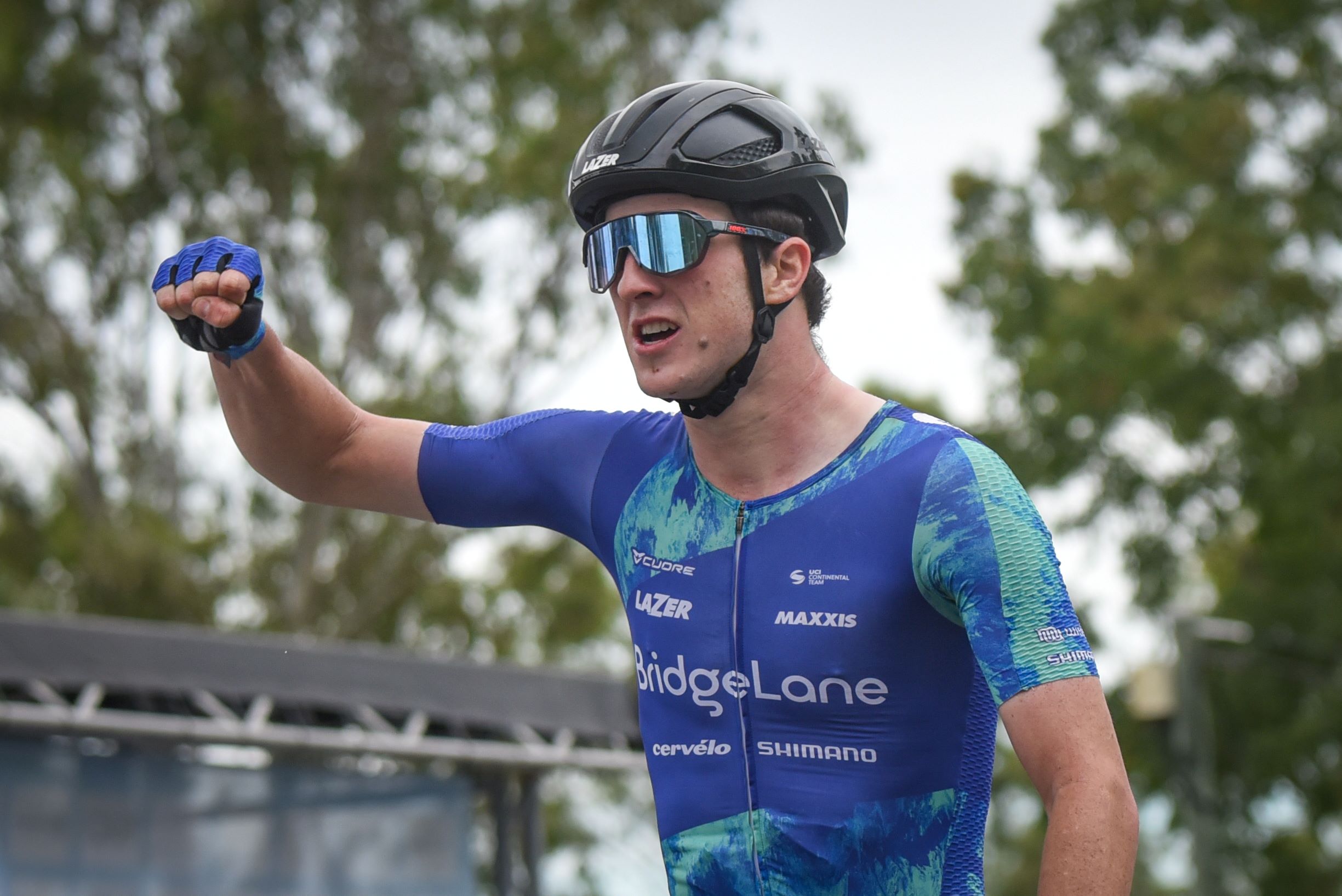 Liam Walsh celebrates winning the 2023 Oceania Road Race Championships. Photo by Craig Render RCPix